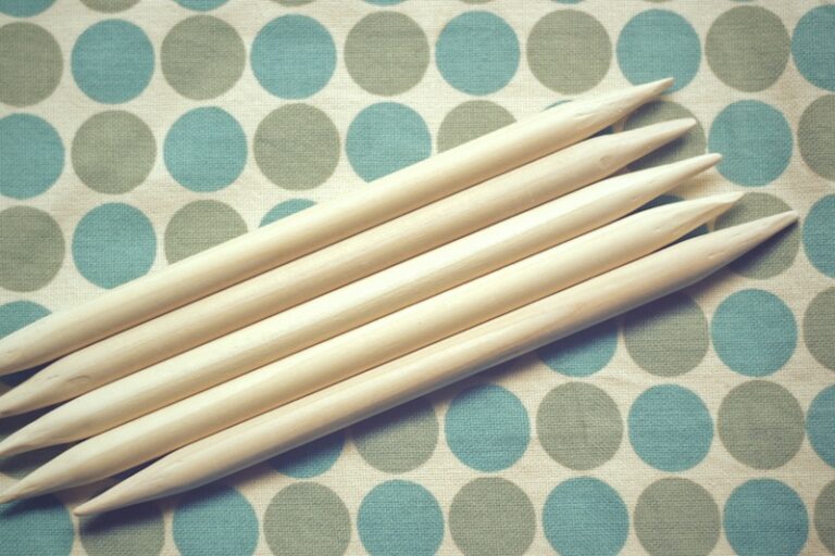 Image of homemade DIY large sized double point needles for bulky knits.