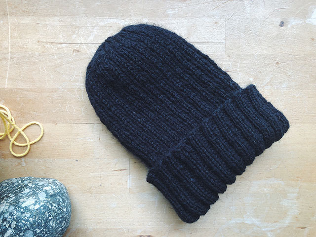 Image of a simple watchman's cap I made my uncle in black wool blend.