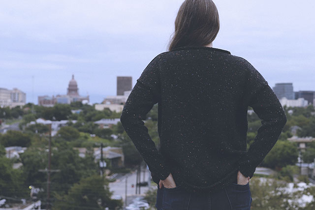 Image of me staring over an Austin neighborhood in my The Bulky Easy One sweater.