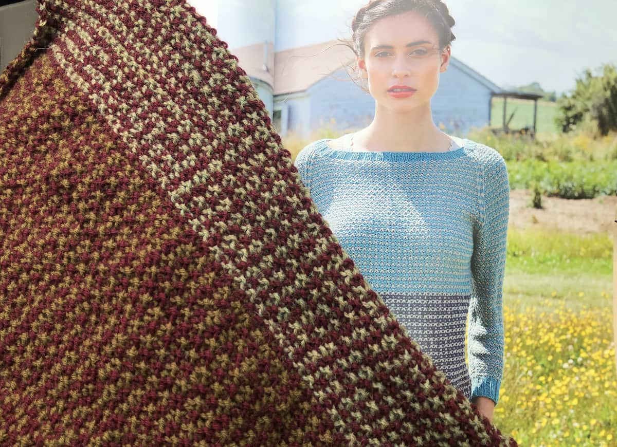 Image of my Umnia sweater in progress with the Martin Storey sample in the background.