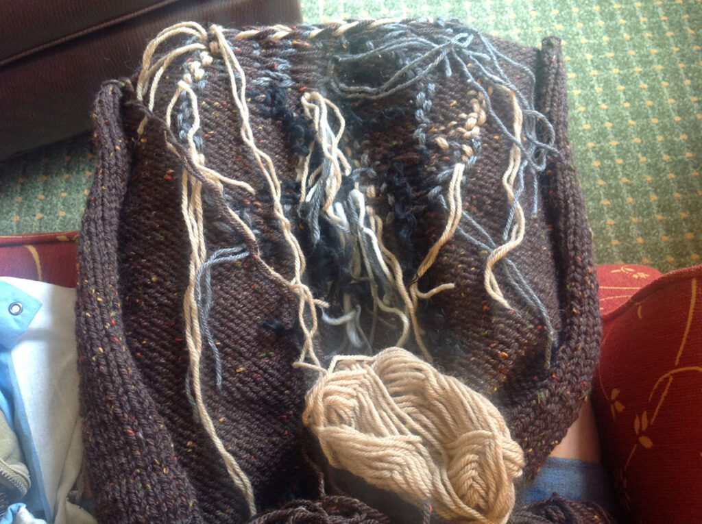 Image of the horribly messy inside of an intarsia bear face sweater.