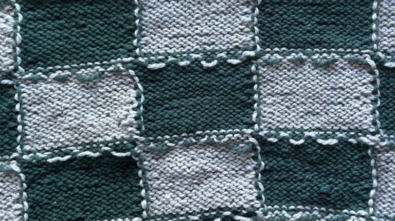 Image of the underside of my improved knitted intarsia checks vest.