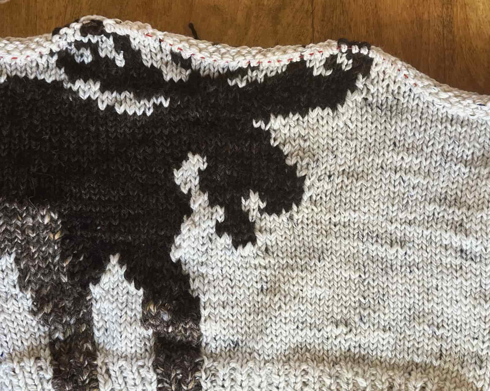 Image of a lazily charted moose sweater motif knit in bulky yarn.