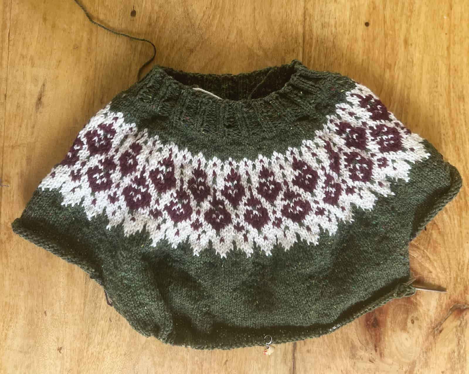 Image of the stranded yoke of my Spleodar sweater in all of it's tweedy glory.